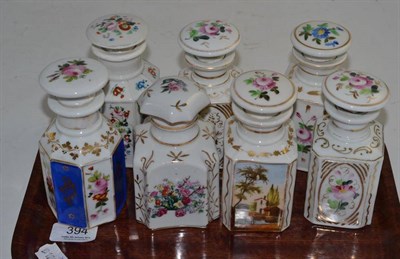 Lot 394 - Seven 19th century Continental floral decorated scent bottles with stoppers