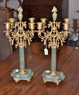 Lot 440 - Pair of Victorian onyx and gilt metal candelabra