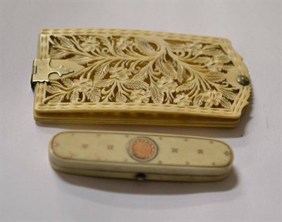 Lot 458 - A French 19th century carved and pierced aide-memoire; an ivory and pique inlaid toothpick...