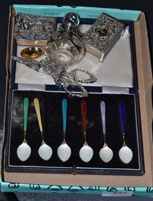 Lot 487 - Six enamel coffee spoons, silver backed miniature birthday book, silver matchbox holder, scent...