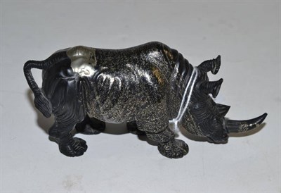 Lot 492 - Carved black and silvery stone rhinoceros with ruby type eyes