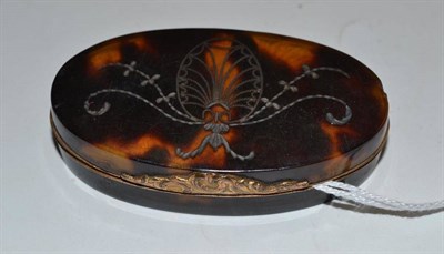 Lot 501 - A brooch in a tortoiseshell box