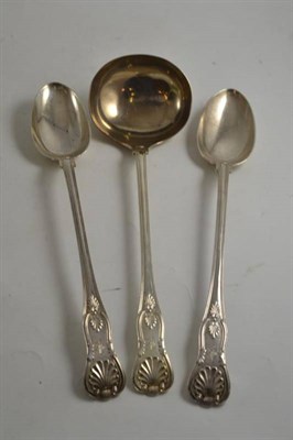 Lot 510 - A silver Kings pattern ladle and two serving spoons