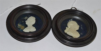 Lot 516 - Pair of miniature wax portraits of George III and Queen Charlotte