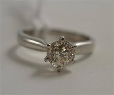 Lot 528 - A platinum diamond solitaire ring, an old cut diamond in a six claw raised setting