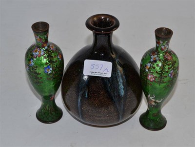 Lot 557 - A Japanese dark brown ovoid vase and a pair of green Ging Bari vases