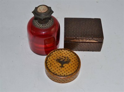 Lot 559 - A cranberry scent bottle with painted insert to lid and two snuff boxes (3)