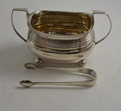 Lot 561 - Georgian silver basin with tongs