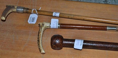 Lot 569 - Kennel man's whip and two hunting whips