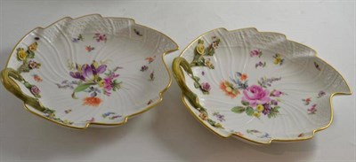 Lot 575 - Pair of Meissen leaf shaped dishes, hand decorated with flowers