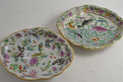 Lot 583 - A 19th century Chinese famille rose shaped oval dish decorated with fish and shell fish and another