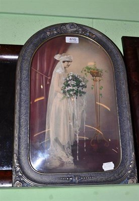 Lot 610 - An American Art Nouveau picture frame depicting with an over-painted photograph