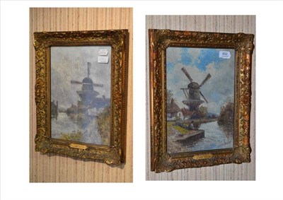 Lot 652 - A pair of oil paintings by J Van Helke ";Near Rotterdam"; and ";On the Scheldt"