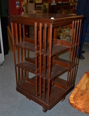 Lot 809 - An Edwardian walnut revolving bookcase