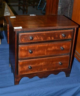 Lot 820 - Miniature mahogany straight front three drawer chest