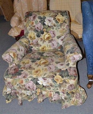 Lot 836 - An early 20th century armchair with floral loose cover