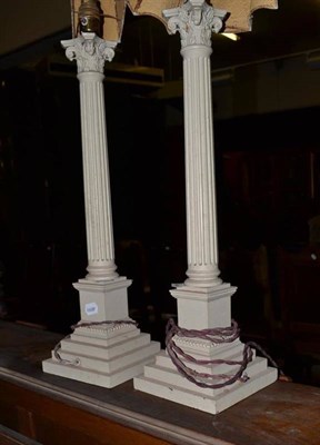 Lot 844 - A pair of painted Corinthian column table lamps