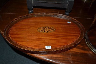 Lot 846 - A late 19th century oval satinwood tray and a mahogany and brass bound tray