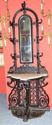 Lot 868 - Victorian cast iron marble top hall stand