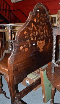 Lot 871 - A Portuguese inlaid and carved rosewood bedstead