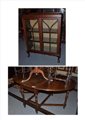 Lot 873 - Oak gateleg table and a glazed display cabinet