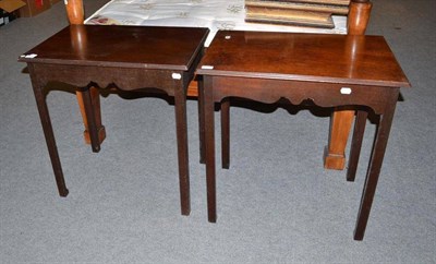 Lot 874 - A matching pair of George III style mahogany side tables on square chamfered legs