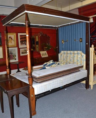 Lot 875 - A mahogany four poster bed with drapery and a modern mattress