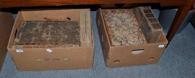 Lot 885 - A quantity of early leather bound books, predominantly folio (in two boxes)