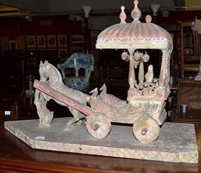 Lot 926 - Indian model of an ornate wagon in painted wood