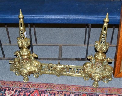 Lot 928 - Ornate brass 19th century French fender in three sections, with spire ends