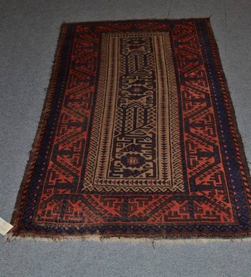 Lot 930 - Unusual Balouch rug Khorasan, the narrow camel field of stylised vines enclosed by latch hook...