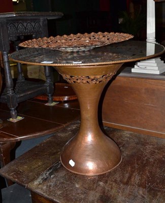 Lot 965 - A Egidio Casagrande copper table with foliate pierced border and glass top, together with two...