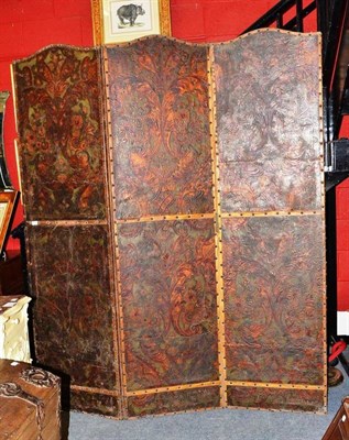 Lot 971 - An 18th century style polychrome painted three-fold leather screen