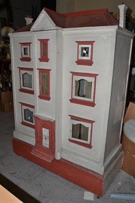 Lot 978 - A large early 20th century floor standing doll's house, comprising of three storeys with six...