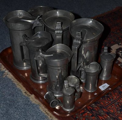 Lot 981 - A set of pewter measures