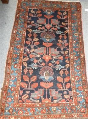 Lot 994 - Hamadan Rug Persian Kurdistan, the deep indigo field with a column of stylised plants enclosed...