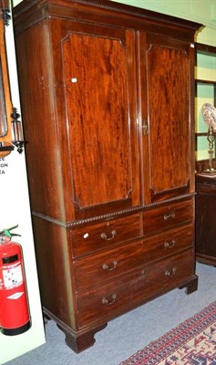 Lot 1002 - Late 19th century mahogany linen press with Greek key pattern cornice