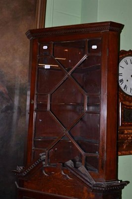 Lot 1014 - Early 19th century mahogany glazed corner cupboard