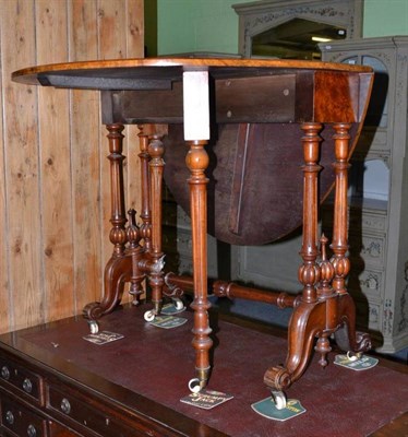 Lot 1020 - A Victorian walnut Sutherland table