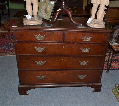 Lot 1035 - George III mahogany five drawer chest fitted later handles