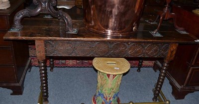 Lot 1038 - An 18th century and later oak side table