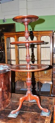 Lot 1040 - A mahogany three tier dumb waiter