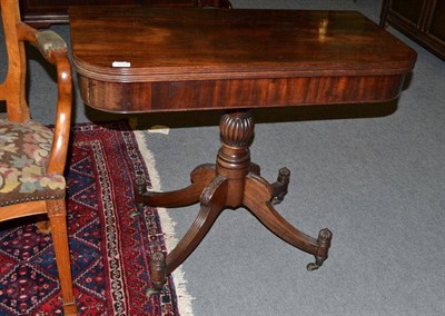 Lot 1049 - A Regency mahogany fold over tea table