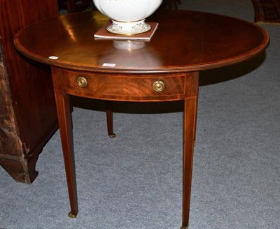 Lot 1050 - A mahogany reproduction Pembroke table