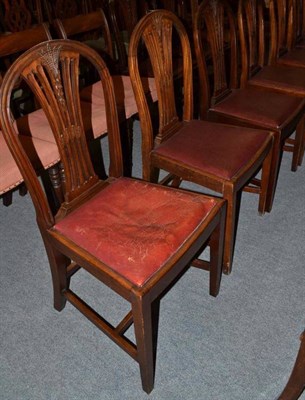 Lot 1063 - A harlequin set of fifteen mahogany dining chairs including two carvers