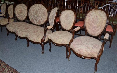 Lot 1065 - A 19th century rosewood three seater settee, a pair of armchairs and a pair of salon chairs