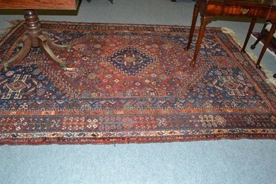 Lot 1075 - Kashgai carpet south west Persia, the stepped lozenge field with plants and flowers around an...