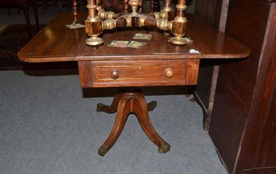 Lot 1083 - Regency rosewood brass inlaid Pembroke table