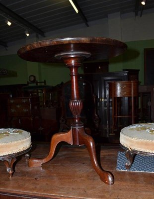 Lot 1088 - A Georgian style mahogany tripod table and a dining chair