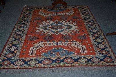 Lot 1094 - Afghan rug of Chelaberd design north west Frontier Province, brick red field centred by an...